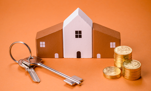 Construction tools and blueprint on orange background, symbolizing fully approved RERA projects